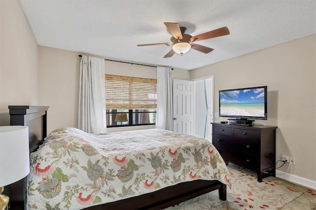 2906 63rd St W Unit 206, Bradenton, FL 34209 - bedroom with baseboards and a ceiling fan