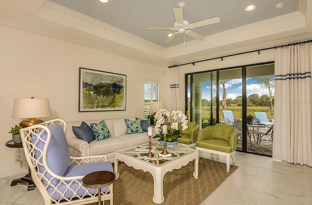 26687 Raphis Royale Blvd, Englewood, FL 34223 - living area featuring a tray ceiling, marble finish floors, recessed lighting, crown molding, and ceiling fan