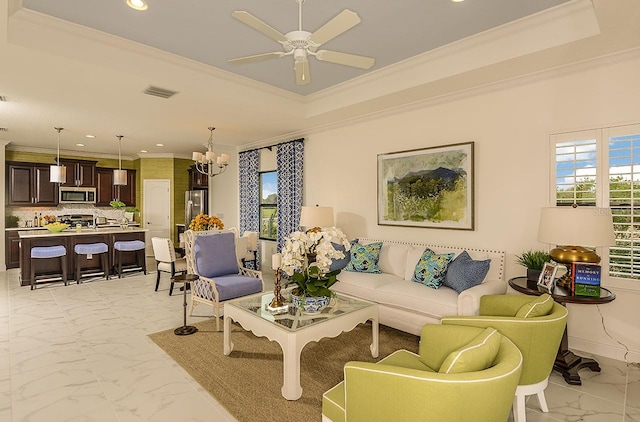 26687 Raphis Royale Blvd, Englewood, FL 34223 - living area featuring ornamental molding, light marble finish floors, recessed lighting, a tray ceiling, and a chandelier