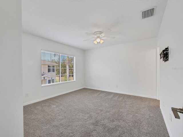262 Cape Harbour Loop Unit 101, Bradenton, FL 34212 - carpeted empty room with a ceiling fan and baseboards