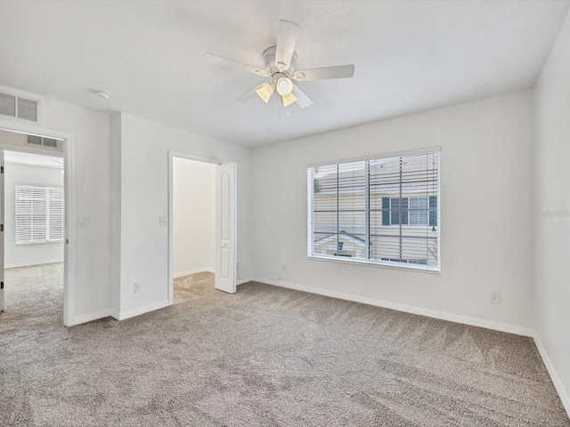 262 Cape Harbour Loop Unit 101, Bradenton, FL 34212 - unfurnished bedroom with carpet flooring and baseboards