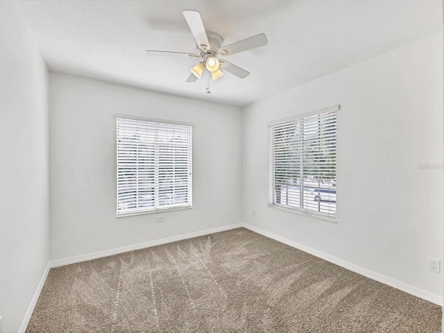 262 Cape Harbour Loop Unit 101, Bradenton, FL 34212 - carpeted empty room with baseboards and a ceiling fan
