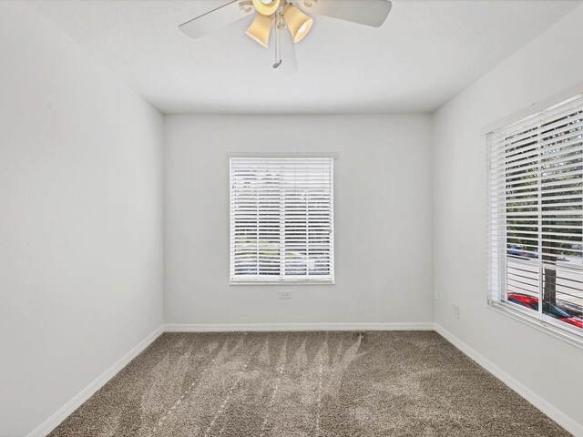 262 Cape Harbour Loop Unit 101, Bradenton, FL 34212 - carpeted empty room with ceiling fan and baseboards