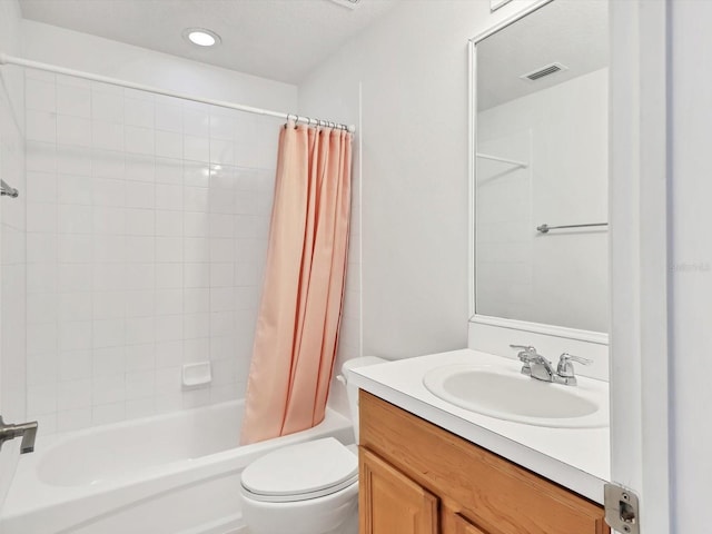 262 Cape Harbour Loop Unit 101, Bradenton, FL 34212 - bathroom with toilet, shower / tub combo, vanity, and recessed lighting