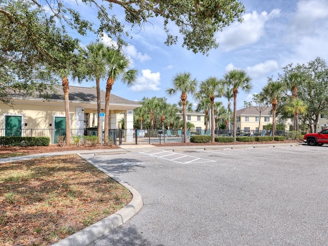 262 Cape Harbour Loop Unit 101, Bradenton, FL 34212 - view of property featuring uncovered parking