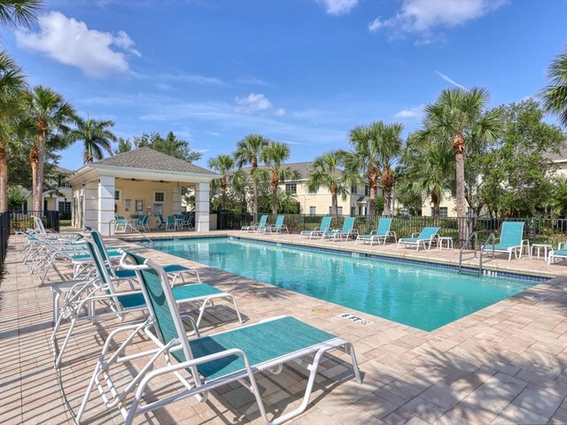 262 Cape Harbour Loop Unit 101, Bradenton, FL 34212 - community pool with a patio area