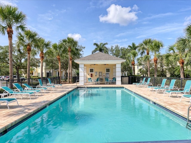 262 Cape Harbour Loop Unit 101, Bradenton, FL 34212 - community pool with a patio area and a ceiling fan