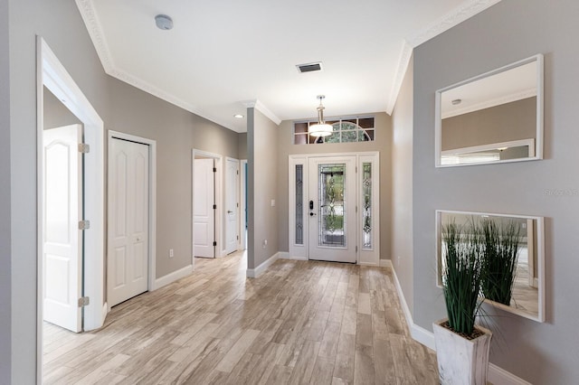 8640 Stone Harbour Loop, Bradenton, FL 34212 - entrance foyer with ornamental molding, light wood-type flooring, and baseboards