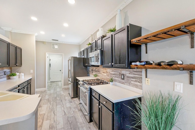 8640 Stone Harbour Loop, Bradenton, FL 34212 - kitchen featuring stainless steel appliances, open shelves, tasteful backsplash, crown molding, and recessed lighting