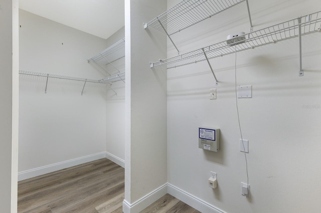 8640 Stone Harbour Loop, Bradenton, FL 34212 - spacious closet featuring wood finished floors