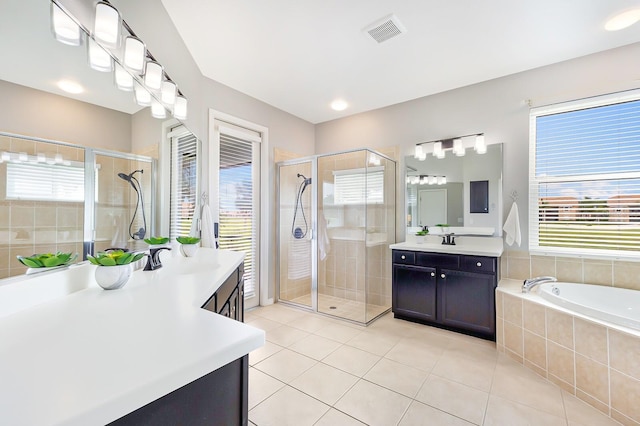 8640 Stone Harbour Loop, Bradenton, FL 34212 - full bathroom with tile patterned floors, a shower stall, and two vanities