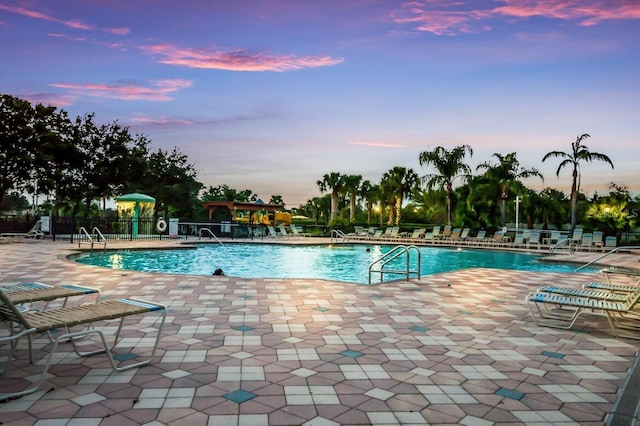 8640 Stone Harbour Loop, Bradenton, FL 34212 - community pool featuring a patio