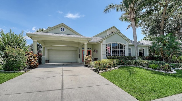 4612 4th Ave E, Bradenton, FL 34208 - single story home with an attached garage, concrete driveway, stucco siding, and a front yard