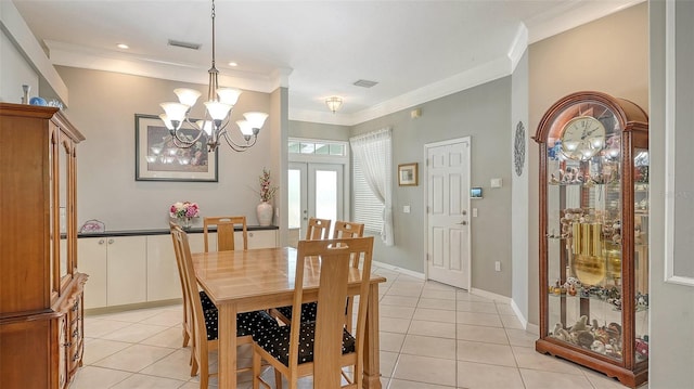 4612 4th Ave E, Bradenton, FL 34208 - dining area with a chandelier, light tile patterned flooring, crown molding, and french doors