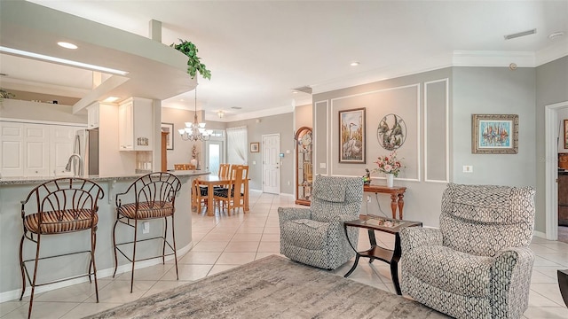 4612 4th Ave E, Bradenton, FL 34208 - living room with light tile patterned flooring, a chandelier, crown molding, recessed lighting, and baseboards