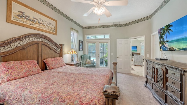 4612 4th Ave E, Bradenton, FL 34208 - bedroom featuring light colored carpet, ceiling fan, ornamental molding, and access to exterior