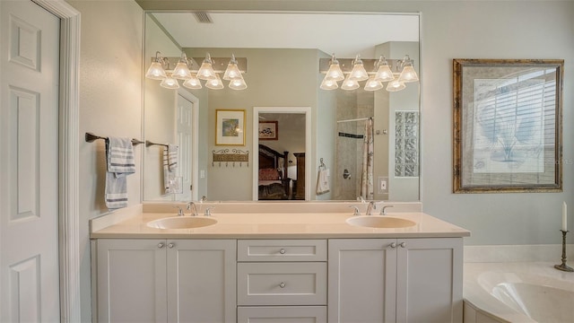 4612 4th Ave E, Bradenton, FL 34208 - full bathroom with double vanity, a shower with curtain, connected bathroom, and a tub