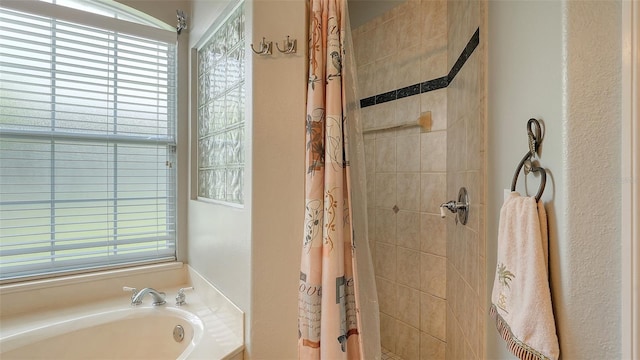 4612 4th Ave E, Bradenton, FL 34208 - bathroom with a bath and a tile shower