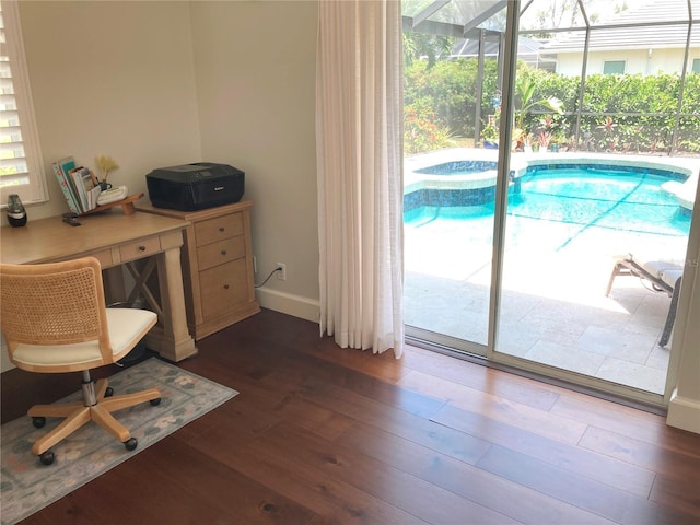 2149 Muskogee Trl, Nokomis, FL 34275 - office space featuring dark wood-style flooring and baseboards