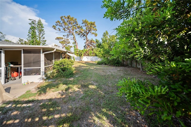 3468 Roslyn Rd, Venice, FL 34293 - fenced backyard with a sunroom