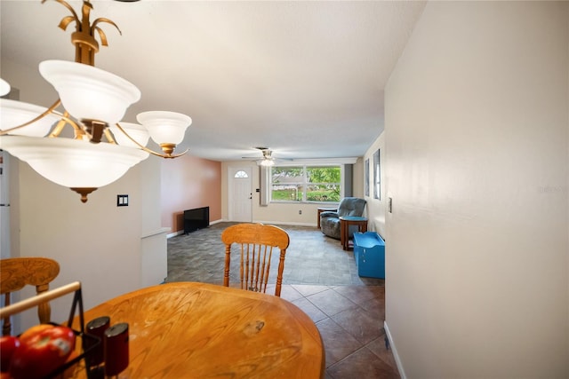 3468 Roslyn Rd, Venice, FL 34293 - dining room featuring ceiling fan, tile patterned flooring, and baseboards
