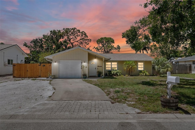 4076 Vana Dr, Sarasota, FL 34241 - ranch-style home featuring driveway, a garage, and a gate
