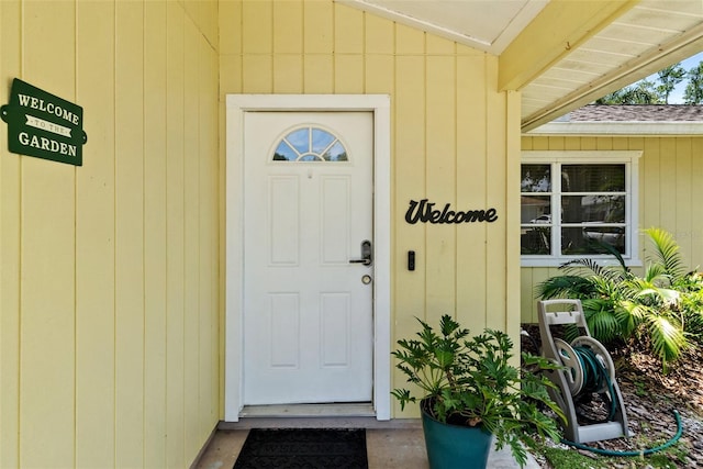 4076 Vana Dr, Sarasota, FL 34241 - property entrance featuring roof with shingles