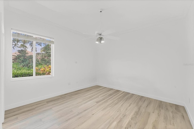 2914 Dick Wilson Dr, Sarasota, FL 34240 - empty room with light wood-style flooring, baseboards, and ceiling fan