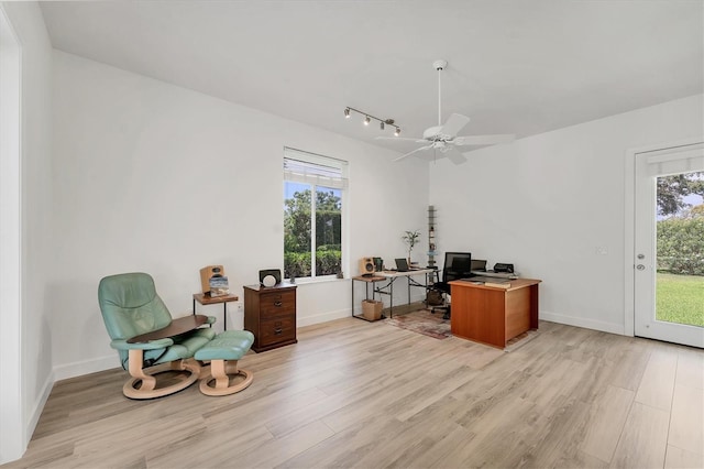 2914 Dick Wilson Dr, Sarasota, FL 34240 - office featuring light wood-type flooring, healthy amount of natural light, and a ceiling fan