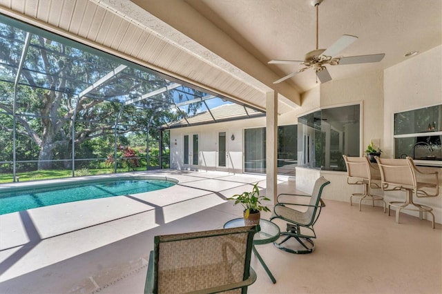 2914 Dick Wilson Dr, Sarasota, FL 34240 - swimming pool featuring a patio area, ceiling fan, and a lanai