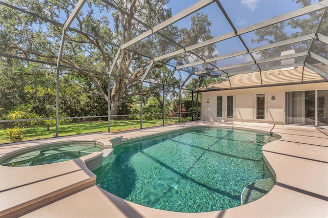 2914 Dick Wilson Dr, Sarasota, FL 34240 - view of swimming pool featuring french doors, a patio, a pool with connected hot tub, and glass enclosure