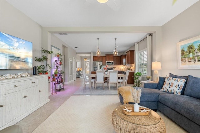 12327 Halfmoon Lake Ter, Bradenton, FL 34211 - living area featuring light tile patterned floors
