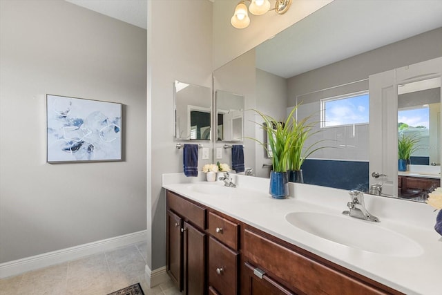 12327 Halfmoon Lake Ter, Bradenton, FL 34211 - full bathroom with double vanity and tile patterned floors