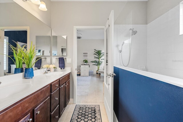 12327 Halfmoon Lake Ter, Bradenton, FL 34211 - full bath with double vanity, a walk in shower, and tile patterned flooring