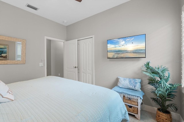 12327 Halfmoon Lake Ter, Bradenton, FL 34211 - bedroom featuring a closet and ceiling fan