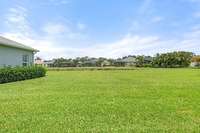 12327 Halfmoon Lake Ter, Bradenton, FL 34211 - view of green lawn with a residential view