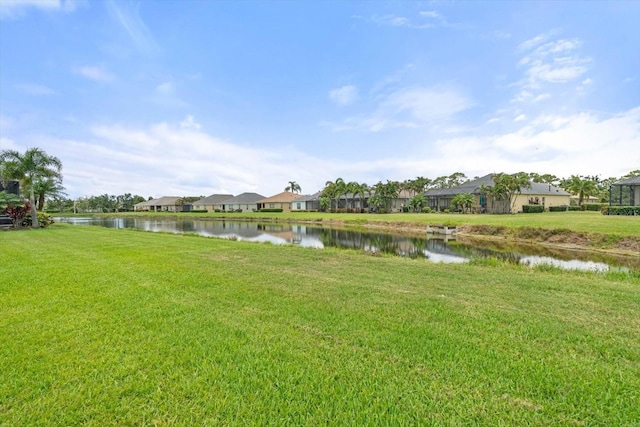 12327 Halfmoon Lake Ter, Bradenton, FL 34211 - view of grassy yard featuring a residential view and a water view
