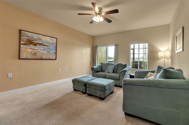 3707 45th Ter W Unit 104, Bradenton, FL 34210 - living area with ceiling fan, light colored carpet, and baseboards