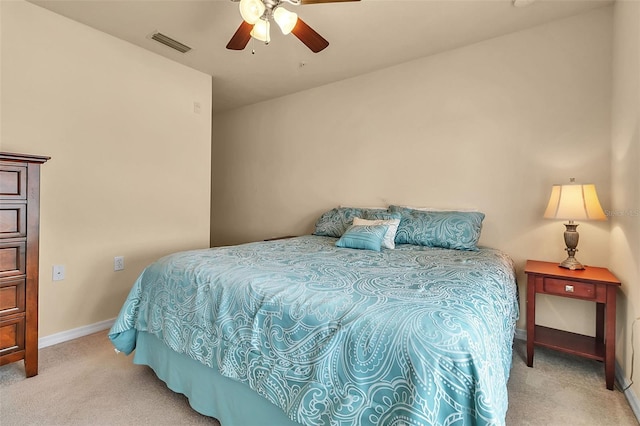 3707 45th Ter W Unit 104, Bradenton, FL 34210 - bedroom featuring light carpet, baseboards, and ceiling fan