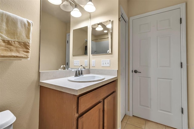 3707 45th Ter W Unit 104, Bradenton, FL 34210 - bathroom with tile patterned flooring, vanity, and toilet