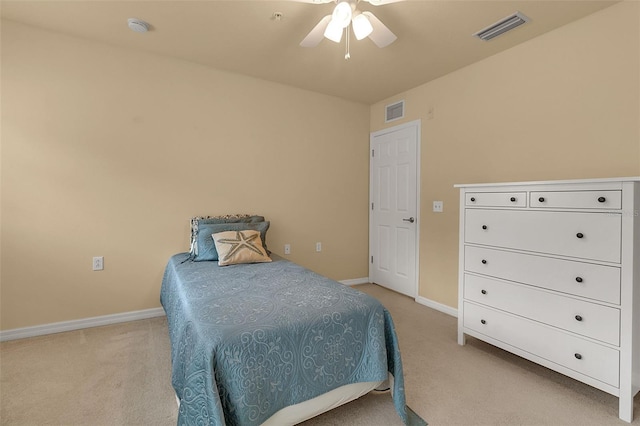 3707 45th Ter W Unit 104, Bradenton, FL 34210 - bedroom featuring light carpet, baseboards, and ceiling fan
