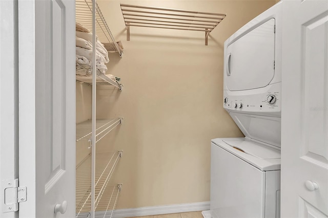 3707 45th Ter W Unit 104, Bradenton, FL 34210 - laundry area featuring stacked washer / drying machine