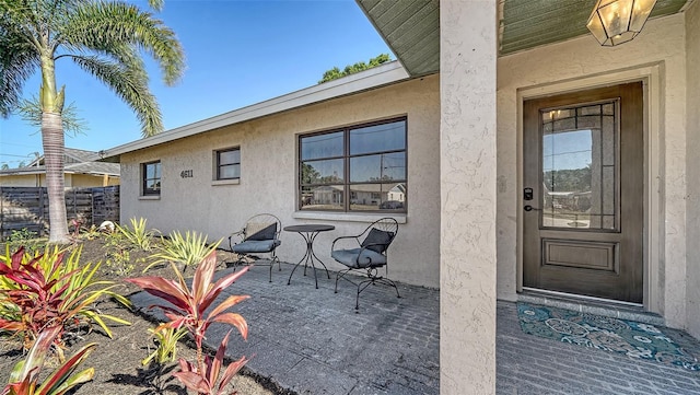 4611 Spahn St, Sarasota, FL 34232 - view of exterior entry featuring stucco siding
