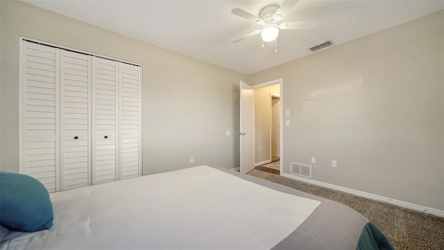 4611 Spahn St, Sarasota, FL 34232 - bedroom with carpet floors, a closet, baseboards, and a ceiling fan
