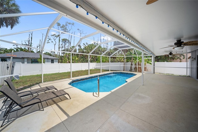 16834 Toledo Blade Blvd, Port Charlotte, FL 33954 - view of swimming pool with a ceiling fan, a fenced backyard, a patio area, and glass enclosure