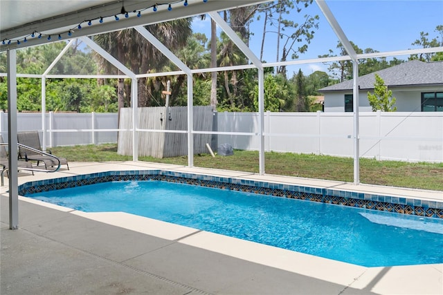 16834 Toledo Blade Blvd, Port Charlotte, FL 33954 - view of swimming pool with a fenced backyard, a patio area, and glass enclosure