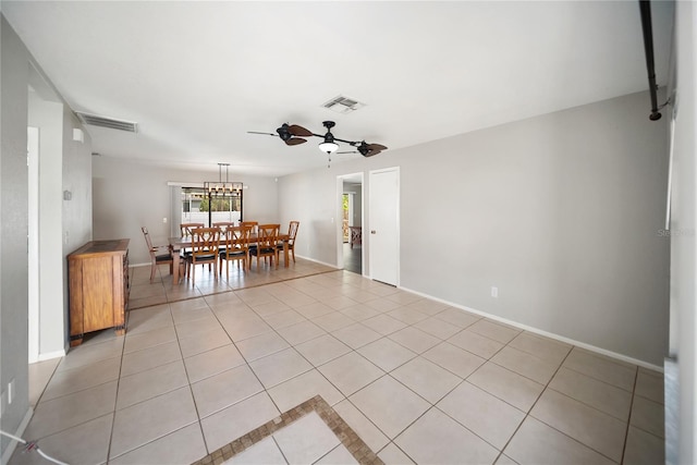 16834 Toledo Blade Blvd, Port Charlotte, FL 33954 - dining space featuring light tile patterned flooring, a ceiling fan, and baseboards