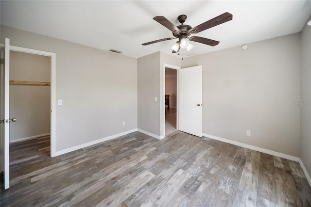 16834 Toledo Blade Blvd, Port Charlotte, FL 33954 - unfurnished bedroom with wood finished floors, baseboards, and a closet