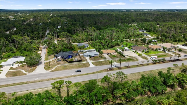 16834 Toledo Blade Blvd, Port Charlotte, FL 33954 - aerial view of property and surrounding area featuring a heavily wooded area