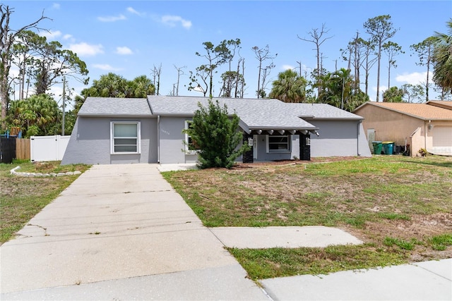 16834 Toledo Blade Blvd, Port Charlotte, FL 33954 - view of front of home featuring driveway and stucco siding